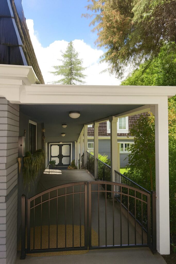 White porch overhang fully restored to be structurally strong and beautiful.